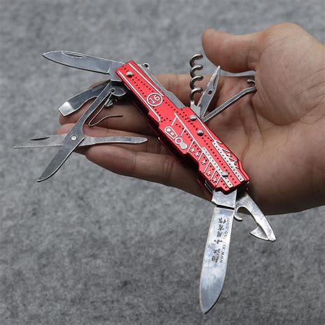 red multi functional tool folding knife stainless steel   multi outdoor camping