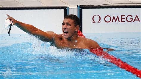 tunisian teen wins surprise olympic swimming gold brand icon image