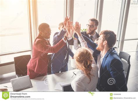 female  male classmates celebrating pathing math examination stock image image  executive