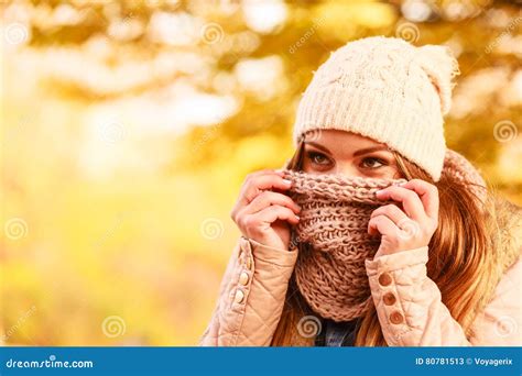 girl hiding  face  scarf stock image image  season leaves