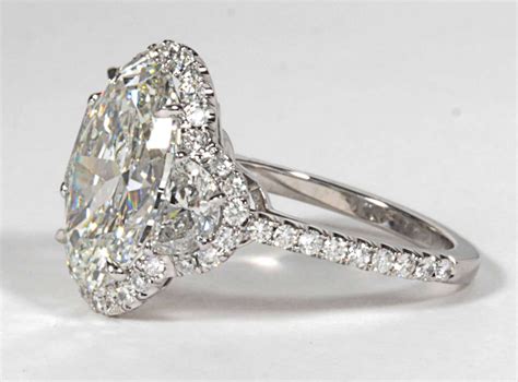 Incredible Five Carat Oval Diamond Platinum Engagement Ring For Sale At