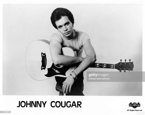 Johnny Cougar Poses For A Publicity Photo For His Debut Album On