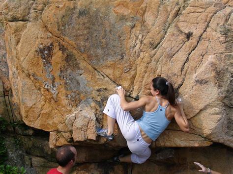 house under a rock climbing girl climbing pants adventure camping