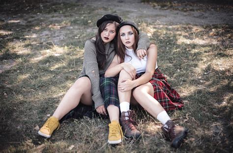 Two Girls Spend Time Together Outdoors The Concept Of Difficult