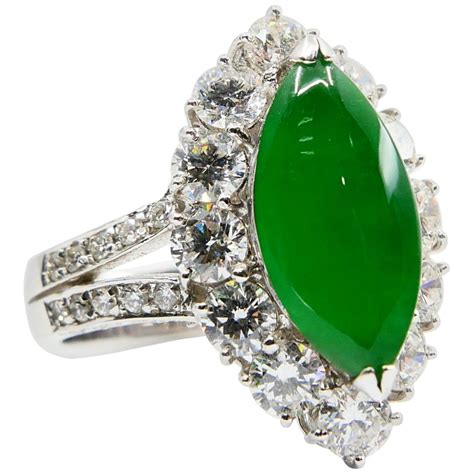 imperial green jadeite jade marquise shape cabochon  diamond ring