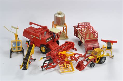 farm toy  models including britains combine mf  front loader   fair