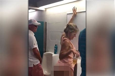 ‘boozy’ Woman Cheered On In Blokes Bogs As She Urinates