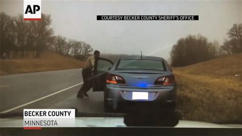 cop barely misses being hit by car during traffic stop