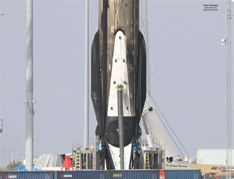 space upclose     time recycled spacex falcon  landing legs retracted  detached