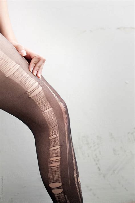 «stressed Woman Torn Pantyhose Detail Del Colaborador De Stocksy