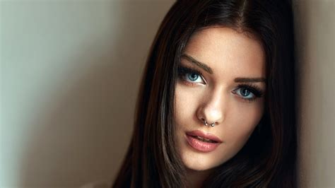 attractive look of girl model veronika ozanova with blue eyes long hair
