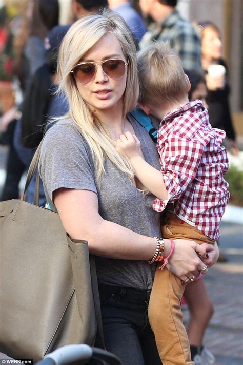hilary duff with estranged husband mike comrie as they