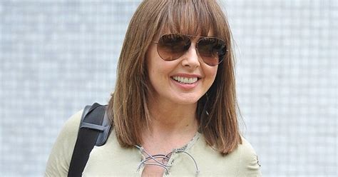 carol vorderman shows off her curves in super tight fitting jeans and military t shirt ~ celebs news