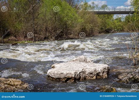strong river current splash  water waves  large stones stock