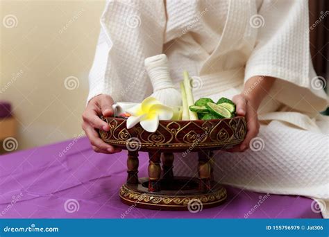 Asian Woman Holding Salt Scrub For Massage At Spa Stock Image Image