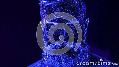 portrait   bearded man  ultraviolet light  smoke stock video video  casual gray