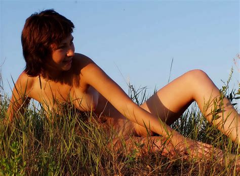 nice short haired girl with very lovely boobs posing naked outdoors russian sexy girls