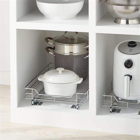 chrome roll out cabinet drawers the container store