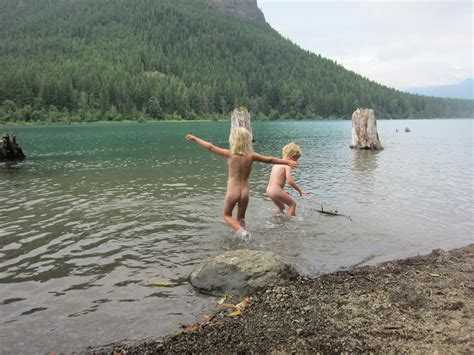 woman skinny dipping waterfall