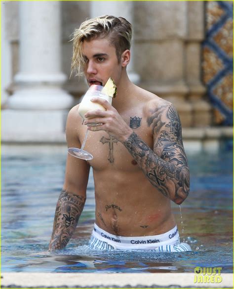 full sized photo of justin bieber goes shirtless for swim