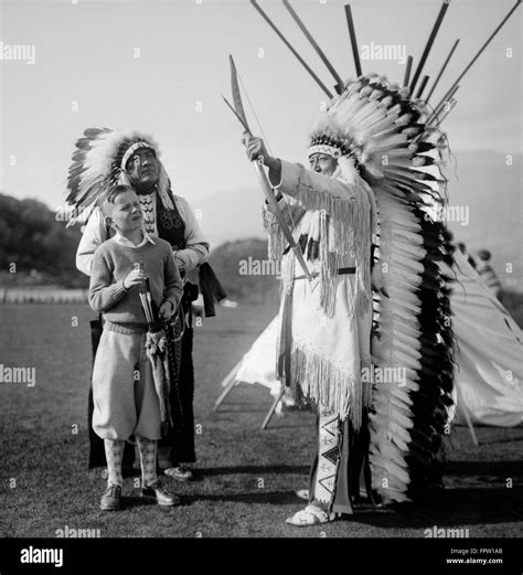 1930s Two Native American Indian Men Wearing Traditional Clothing