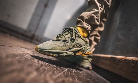 adidas ozweego olive green asics sneaker olive green cleats footwear adidas inspo sneakers