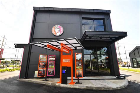 dunkin donuts drive  opens  thailand  location offers    donuts