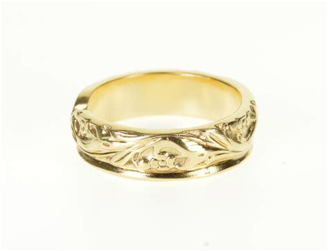 ornate leaf vine scroll patterned wedding band yellow gold ring size  property room