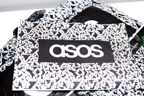 asos shares tumble  lowered profit guidance  customers return clothing  bulk uk investor
