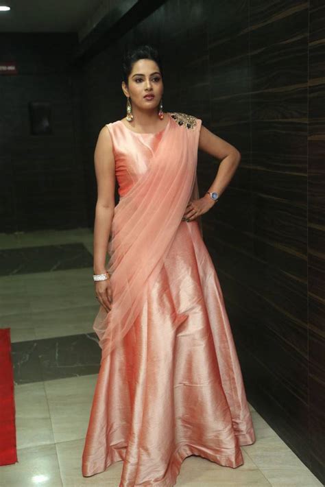 Beautiful Indian Girl Tv Anchor Himaja Photos In Pink Saree At Movie