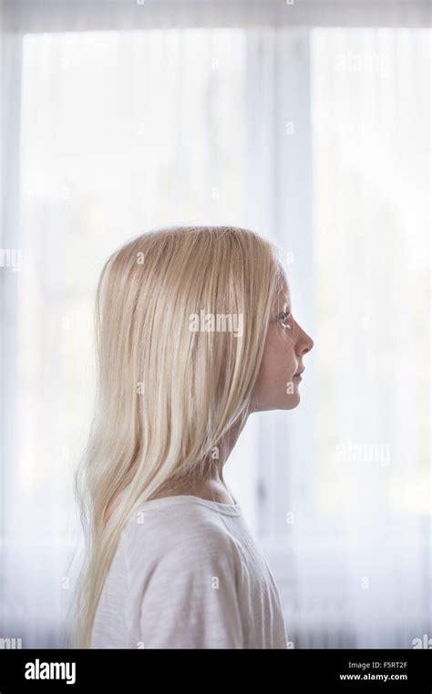 Sweden Side View Of Blonde Girl 10 11 In Front Of White Curtains