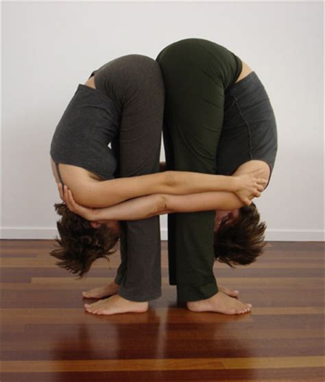 partner yoga pose double standing  bend popsugar fitness