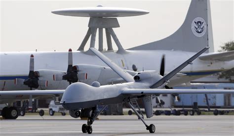 faa official  armed drones   washington times