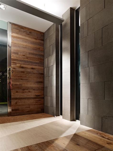 Modern Foyer with Tile Walls | HGTV