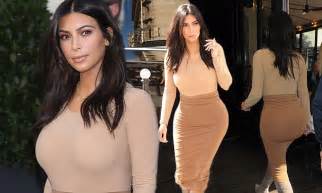 Kim Kardashian Highlights Her Curvaceous Figure In Form Fitting