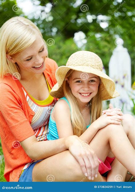 Making Summer Memories Cute Litte Girl Sitting On The Grass Outdoors With Her Mom Stock Image