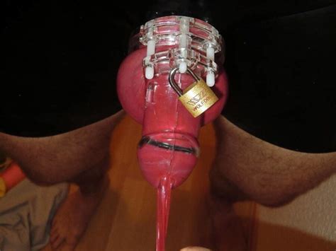 red condom under chastity with latex panty fetish porn pic