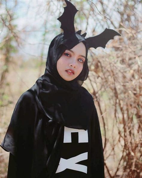 woman uses her hijab to capture the essence of anime cosplay