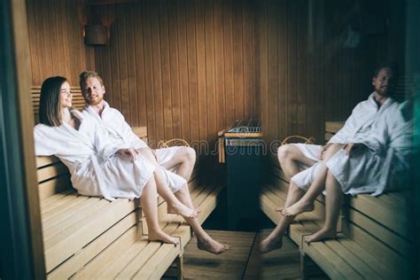 Couple Relaxing In Sauna And Caring About Health And Skin Stock Image