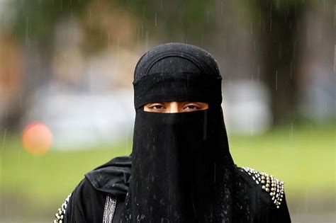 muslim woman has face veil ripped off in racist attack outside london