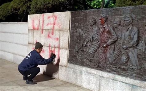 police  anti  military activist vandalized douglas macarthur statue  south korea stars