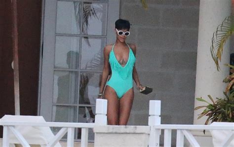 rihanna dons plunging swimwear as she unwinds in barbados metro news