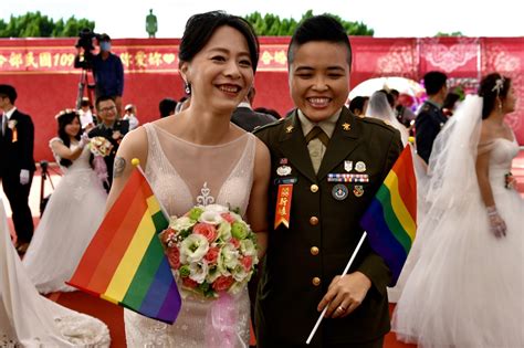 same sex couples tie the knot in taiwan military mass