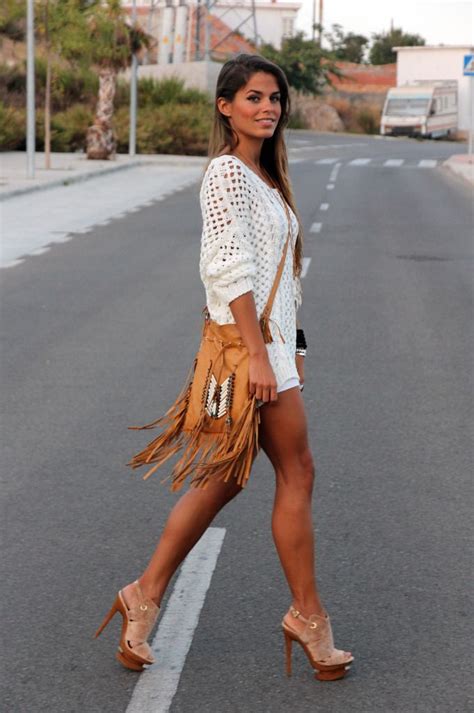 street style model takes her toned bronzed legs for a walk