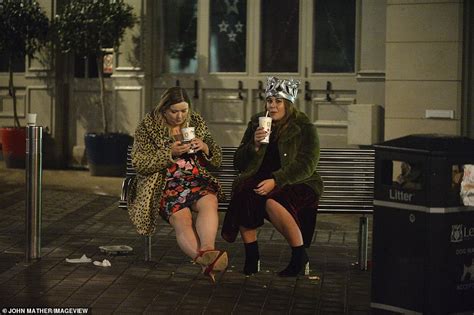 Christmas Revellers Enjoy A Drunken Night On The Tiles Daily Mail Online