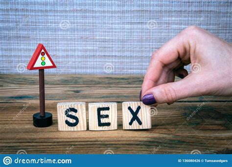 Sex Name From Wooden Letters With A Traffic Light Road