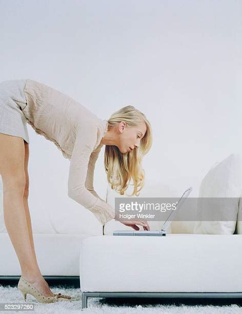 bending over in skirt photos et images de collection getty images