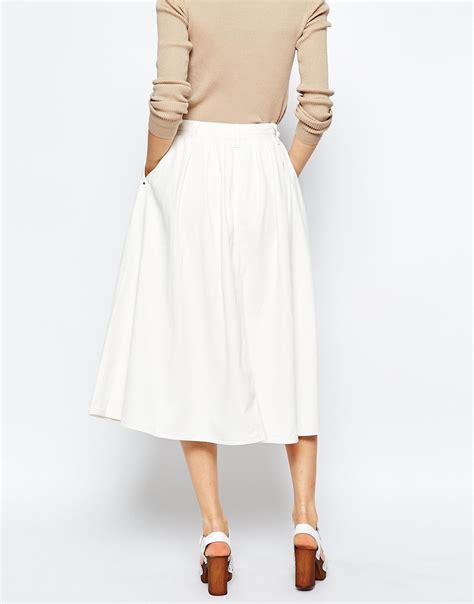 lyst asos denim high waisted button through midi skirt in white in white