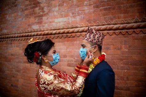 asia album nepali couple wear masks at wedding ceremony in kathmandu