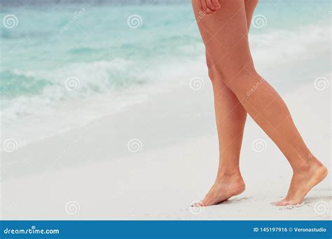 Woman Legs Closeup Walking On White Sand Relaxing In Beach Lean And